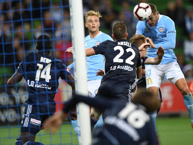 Dario Vidosic of City (second from right) scores a goal in injury time during the Round 9 A-League match between Melbourne City and Melbourne Victory at AAMI Park, in Melbourne, Saturday, December 22, 2018. (AAP Image/Julian Smith) NO ARCHIVING, EDITORIAL USE ONLY