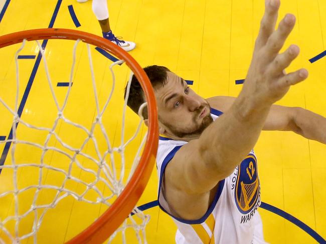 OAKLAND, CA - JUNE 13: J.R. Smith #5 of the Cleveland Cavaliers goes up for a shot against Andrew Bogut #12 of the Golden State Warriors in the second half in Game 5 of the 2016 NBA Finals at ORACLE Arena on June 13, 2016 in Oakland, California. NOTE TO USER: User expressly acknowledges and agrees that, by downloading and or using this photograph, User is consenting to the terms and conditions of the Getty Images License Agreement. Ezra Shaw/Getty Images/AFP == FOR NEWSPAPERS, INTERNET, TELCOS & TELEVISION USE ONLY ==