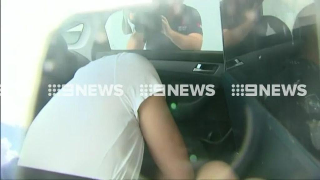 Australian swimmer Grant Hackett arrested and taken to southport watch-house. Courtesy: Nine News