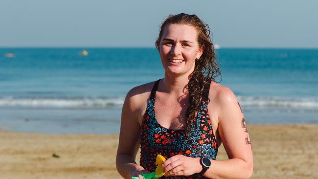 Rachel Brodie was the first woman ashore in the 1.2km McArthur River Mining Darwin Ocean Swim event at Casuarina Beach. Picture: Glenn Campbell