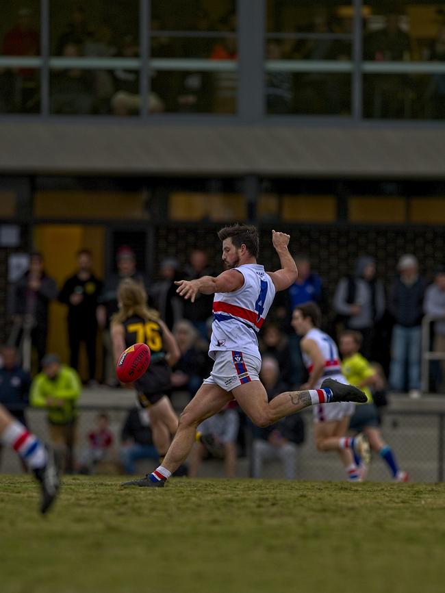 Adrian Speedy boots Mornington into attack.