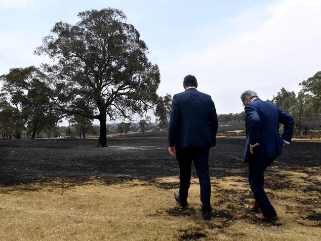 Premier Steven Marshall visiting a burnt area in the suburb of Woodside with the Governor Hieu Van Le. Picture Tricia Watkinson