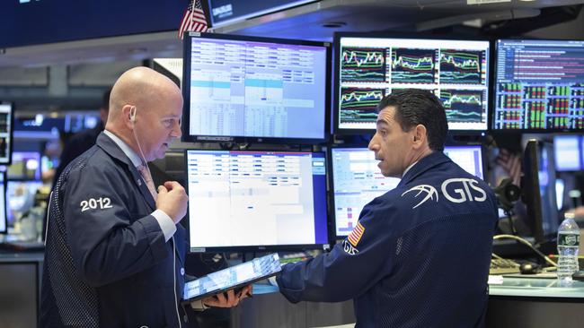 After rallying early, US stocks turned lower after New York ordered nearly all workers to stay home. Picture: AP