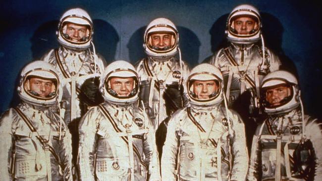 NASA’s original seven Mercury astronauts wearing their silver spacesuits in 1961. 