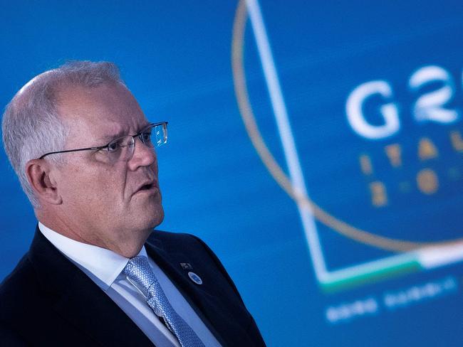 Australian Prime Minister Scott Morrison arrives for a meeting about the global supply chain, during the G20 Summit at the Roma Convention Center La Nuvola on October 31, 2021, in Rome, Italy. (Photo by Brendan Smialowski / AFP)