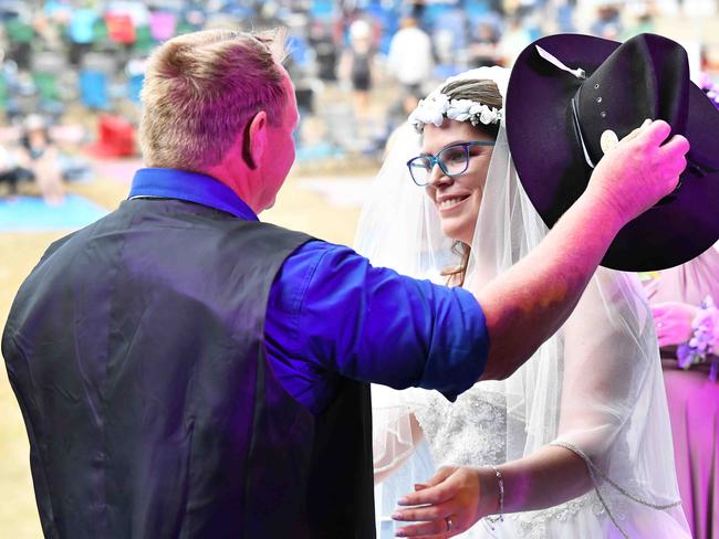 Simone Ward and Geoffrey Borninkhof, were married on The Hill Stage at Gympie Music Muster. Picture: Patrick Woods.