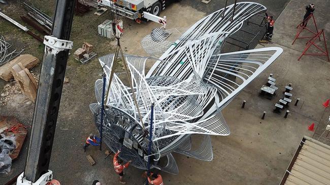 The ‘Uniting a Nation’ sculpture by Terrance Plowright is loaded by crane onto a truck .Picture: Terrance Plowright