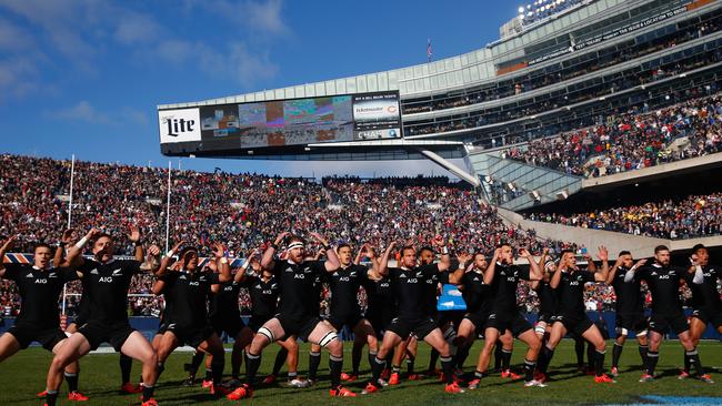 The All Blacks perform the haka at a sold-out Soldier Field.