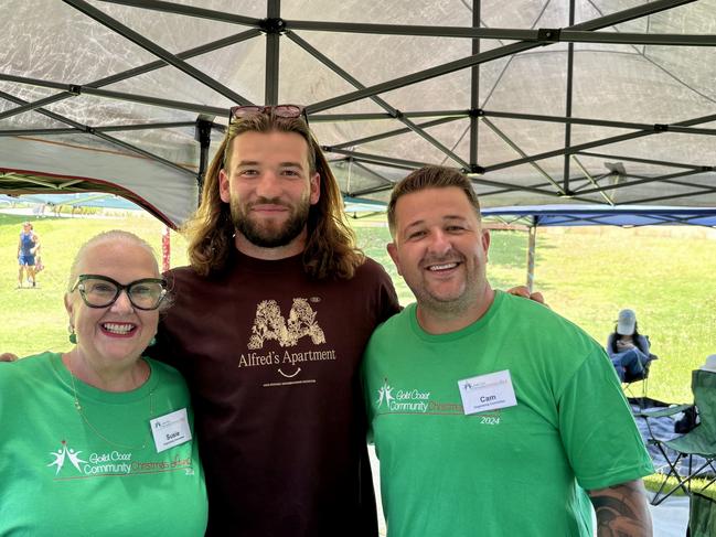 Left to right: Susie Longman, Patrick Carrigan, Cameron Christie. Gold Coast community Christmas lunch 2024. Photo: Jacklyn O'Brien.