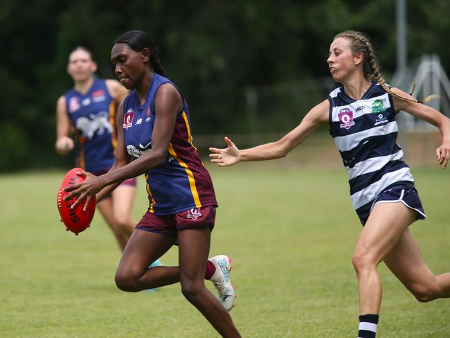 Lions midfielder Delphina Day attacking. Cairns City Lions Women's v Port Douglas Crocs Women's at Holloways Beach. AFLW Cairns 2024. Photo: Gyan-Reece Rocha