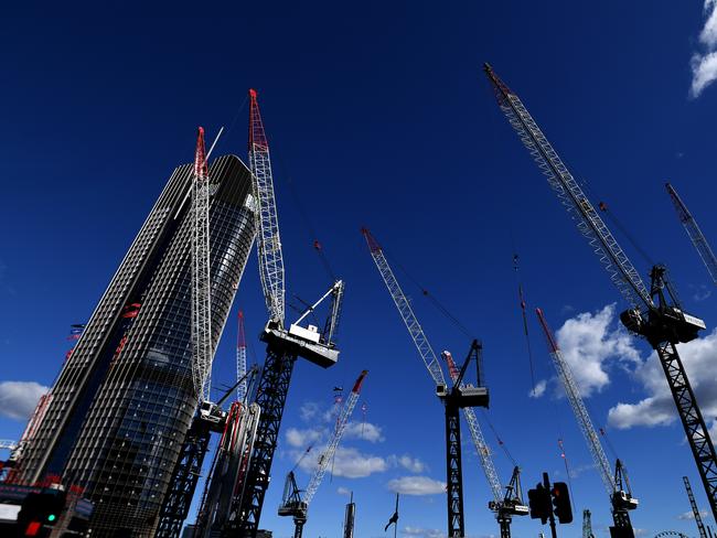 The 1 William street office tower (left), home to state government offices, is seen through cranes at the construction site of the QueenÃ¢â¬â¢s Wharf development in Brisbane, Tuesday, June 23, 2020. (AAP Image/Dan Peled) NO ARCHIVING