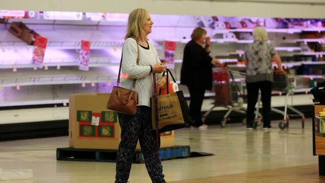 Shelves at Coles Coburg were already emptied this morning. Picture: Mark Stewart