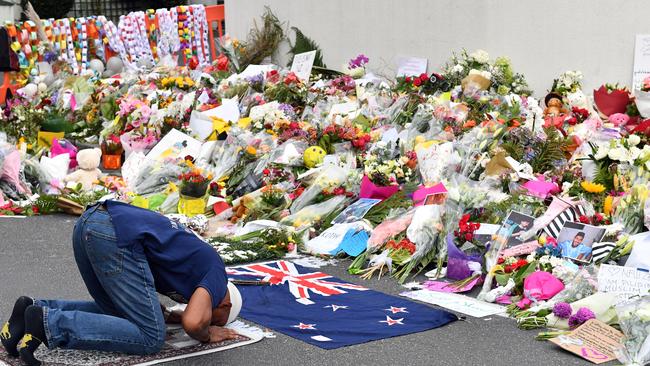 A Muslim worshipper prays at a makeshift memorial at the Al Noor Mosque in Christchurch in March. Picture: AAP