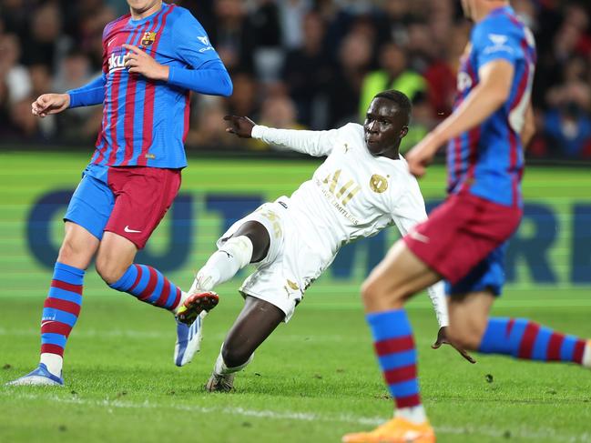 SYDNEY, AUSTRALIA - MAY 25: Garang Kuol of the All Stars shoots during the match between FC Barcelona and the A-League All Stars at Accor Stadium on May 25, 2022 in Sydney, Australia. (Photo by Mark Metcalfe/Getty Images)