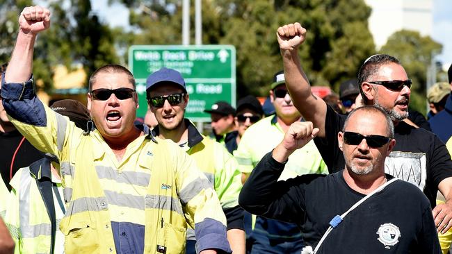 Workers walk off the job at Webb Dock. Picture: Nicole Garmston