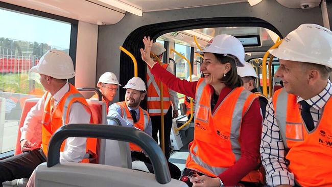 Premier Gladys Berejiklian and Transport Minister Andrew Constance among a group enjoying  a test ride on a light rail vehicle in Randwick earlier this year.