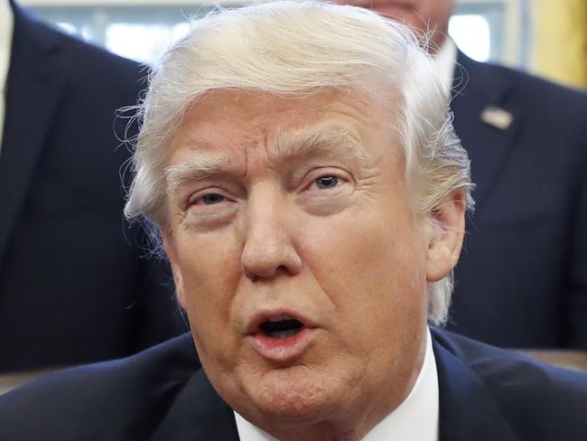 President Donald Trump speaks after signing executive actions in the Oval Office at the White House, Saturday, Jan. 28, 2017 in Washington. (AP Photo/Alex Brandon)