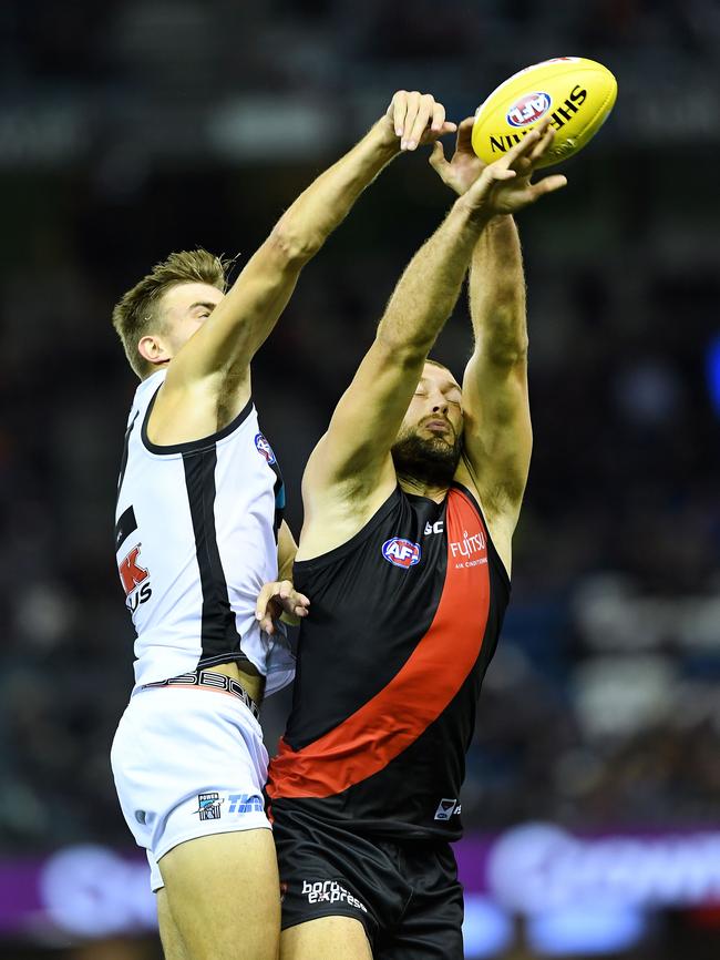 Dougal Howard rucks against Tom Bellchambers on Sunday. Picture: Mark Brake/Getty Images