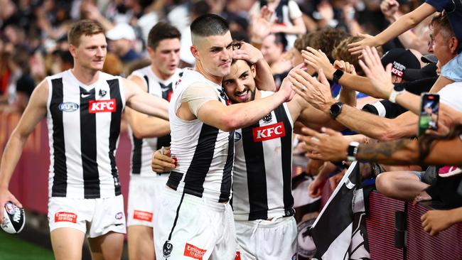 BRISBANE, AUSTRALIA - MARCH 28: Brayden Maynard and Josh Daicos of the Magpies celebrate winning the round three AFL match between Brisbane Lions and Collingwood Magpies at The Gabba, on March 28, 2024, in Brisbane, Australia. (Photo by Chris Hyde/Getty Images)