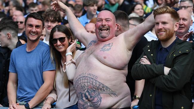 Fans of Newcastle United pose for a photograph prior to kick off of the Premier League match between Manchester City and Newcastle United. They weren’t smiling long. (Photo by Stu Forster/Getty Images)