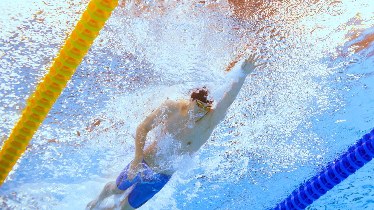 China's Zhanle Pan competes in the final of the men's 4X100m freestyle relay swimming event during the 2024 World Aquatics Championships at Aspire Dome in Doha on February 11, 2024. (Photo by Oli SCARFF / AFP)