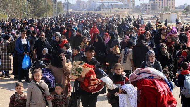 Palestinians carry some belongings as they flee Khan Younis to safer areas further south. Picture: AFP