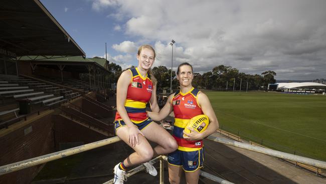 Adelaide Crows player Brooke Tonon with her captain Chelsea Randall at Thebarton Oval. Picture: Simon Cross