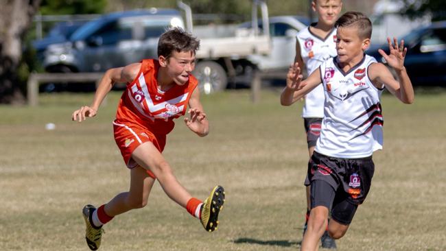 SWANS POWER: Lismore Swans U11 player Harvey Power was a ball of energy and showed great form during the match against the Burleigh Bombers White. Photo: Daniel Cohen