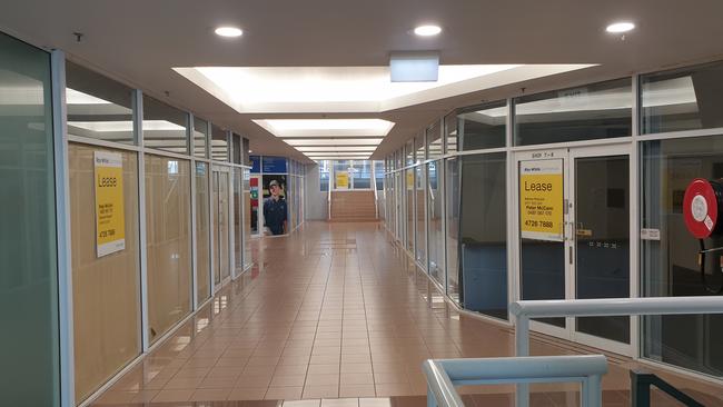 An upstairs arcade in the Citilink building in Flinders Street, Townsville, is largely vacant.