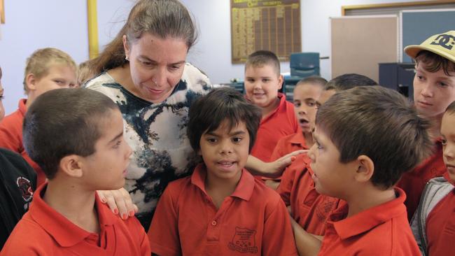 Choir director Michelle Leonard with some of the kids from Lightning Ridge in Wide Open Sky.