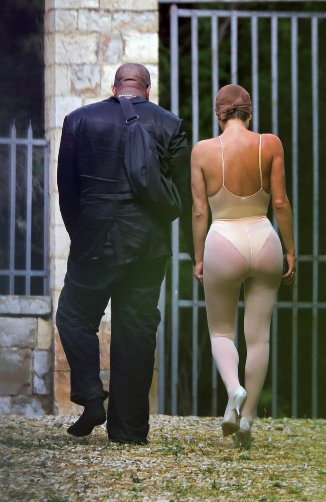 August 6, 2023: Another day, another pair of tights. The couple were photographed in Tuscany, with Censore wearing see through tights and a nude coloured bodysuit. Picture: COBRA TEAM / BACKGRID