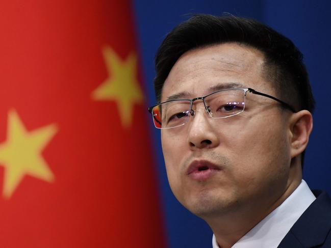 Chinese Foreign Ministry spokesman Zhao Lijian speaks at the daily media briefing in Beijing on April 8, 2020. (Photo by GREG BAKER / AFP)