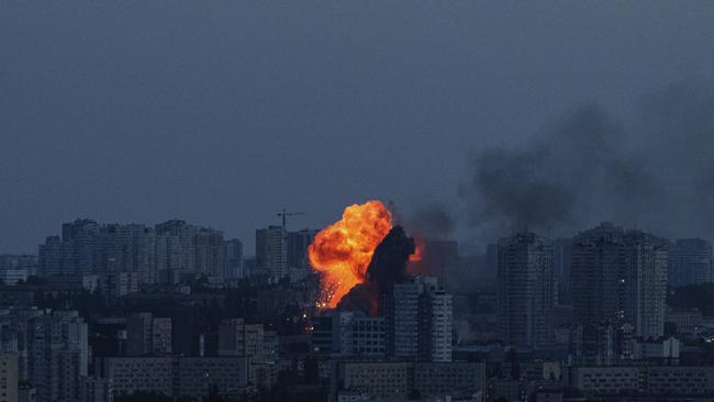 An explosion is seen after a Russian air strike on Kyiv on Friday Picture: AP /Evgeniy Maloletka