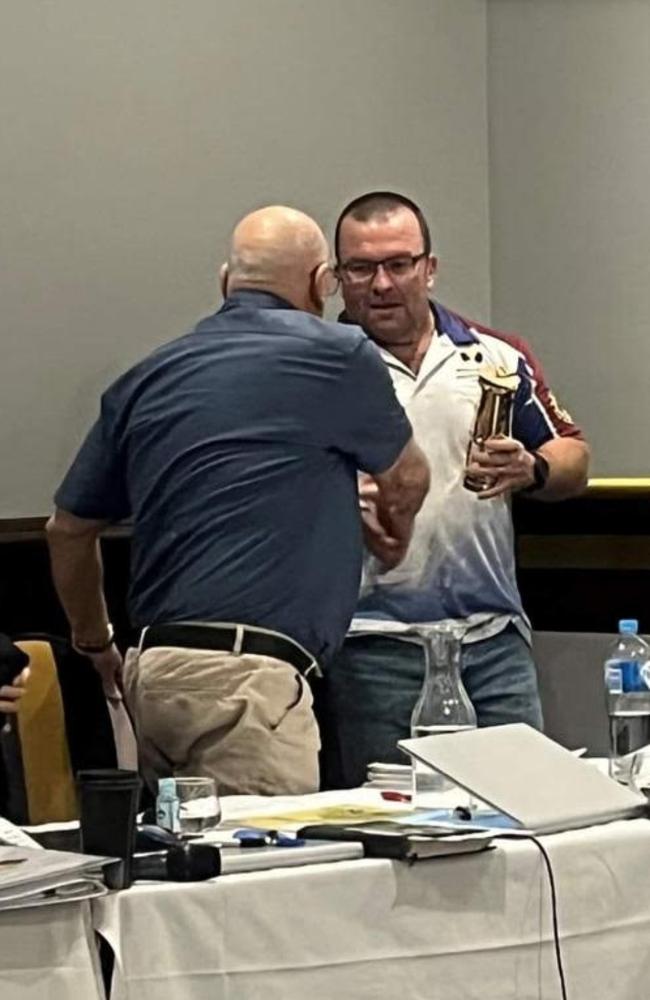 CFMEU president Stephen Smyth presenting a Miners' Flame Safety Lamp to lifelong unionist Arch Tudehope. Picture: Contributed