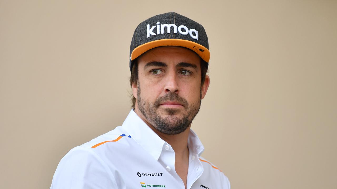 Fernando Alonso arrives at the paddock ahead of F1 testing at Bahrain in March.