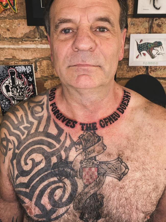 Former CFMEU Victorian secretary John Setka with his new tattoo “God Forgives, The CFMEU doesn’t”.