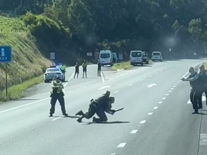 A knife-wielding woman tackled on the highway near Taree on Tuesday afternoon. Picture: Aaron The Typical Trucker