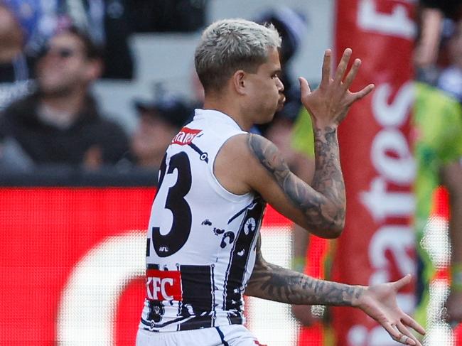 MELBOURNE, AUSTRALIA - MAY 18: Bobby Hill of the Magpies celebrates a goal during the 2024 AFL Round 10 match between The Collingwood Magpies and Kuwarna (Adelaide Crows) at The Melbourne Cricket Ground on May 18, 2024 in Melbourne, Australia. (Photo by Dylan Burns/AFL Photos via Getty Images)