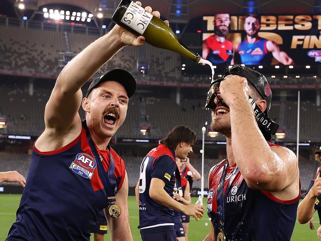 Alex Neal-Bullen and Jake Lever celebrate Melbourne’s premiership win in 2021. Picture: Michael Klein