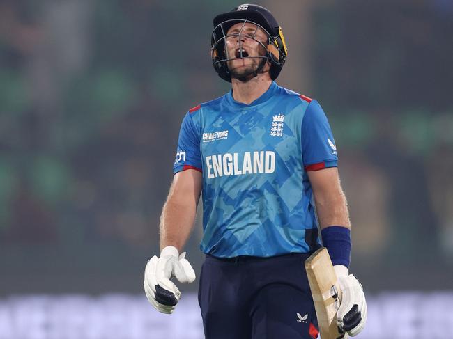 LAHORE, PAKISTAN - FEBRUARY 26: Joe Root of England leaves the field after being dismissed during the ICC Champions Trophy 2025 match between Afghanistan and England at Gaddafi Stadium on February 26, 2025 in Lahore, Pakistan. (Photo by Matthew Lewis-ICC/ICC via Getty Images)