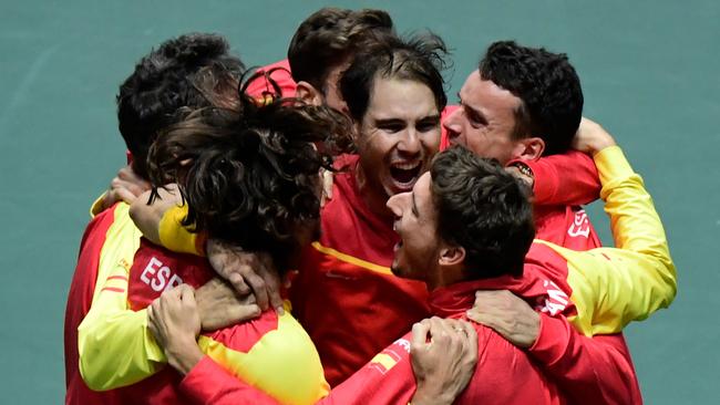 Spain celebrates after downing Canada in the Davis Cup final.