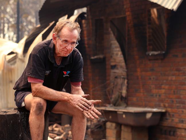 Daily Telegraph. Houses lost in the Nana Glen bushfrie. Mechanic Warren Smith at his destroyed home on Ellems Quarry Rd, Nana Glen. Picture Nathan Edwards.