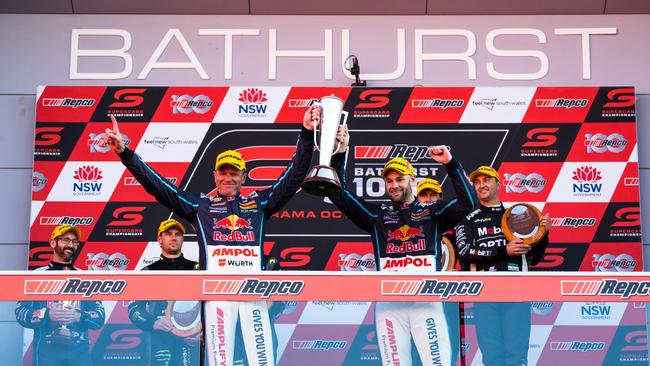 Shane van Gisbergen and Garth Tander celebrate after winning the Bathurst 1000, which is race 30 of 2022 Supercars Championship Season at Mount Panorama on October 09, 2022 in Bathurst, Australia. (Photo by Daniel Kalisz/Getty Images)