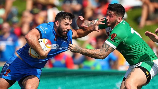 James Tedesco (left) in on-field action for Italy against Ireland. Photo: Chris Hyde