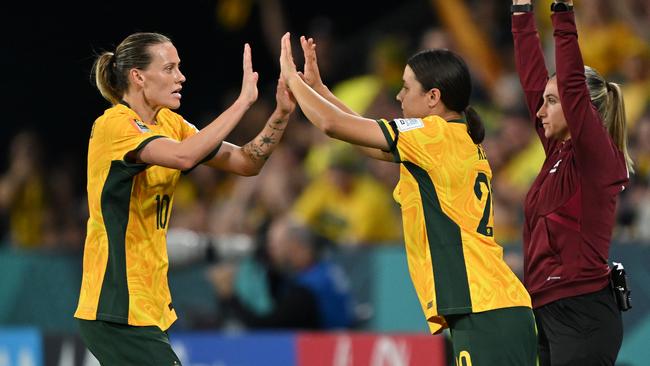 Suncorp Stadium erupts. Photo by Bradley Kanaris/Getty Images)