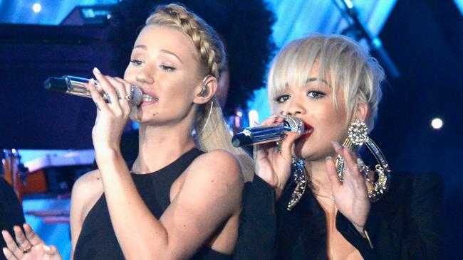 Iggy Azalea performs with Rita Ora during the Pre-Grammy Gala and Salute To Industry Icons. (Pic by Kevork Djansezian/Getty Images)