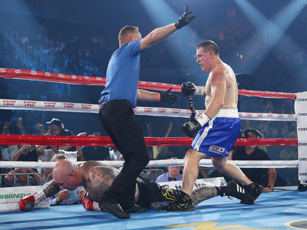 Lucas Browne hits the deck after being punched by Paul Gallen. (Photo by Mark Metcalfe/Getty Images)