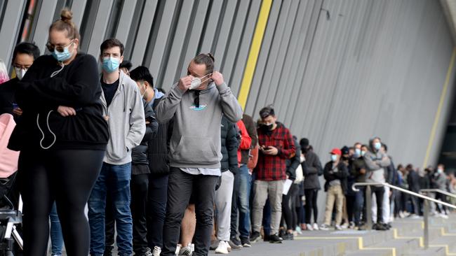 Long queues at the Melbourne Convention and Exhibition Centre on Wednesday. Picture: Andrew Henshaw