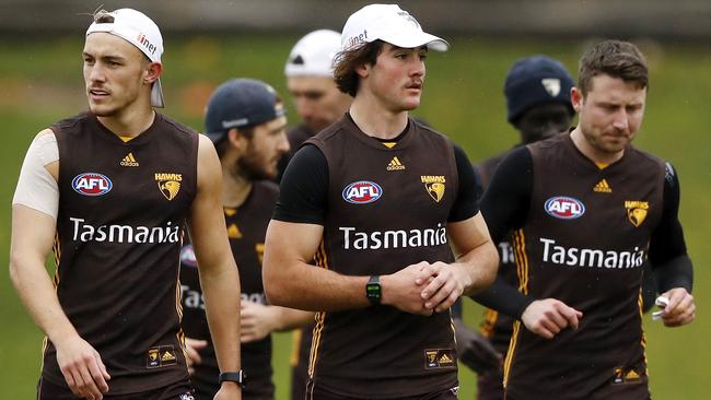 If you don’t have him, Hawk Jai Newcombe, middle, is your man this week. Picture: Dylan Burns/AFL Photos