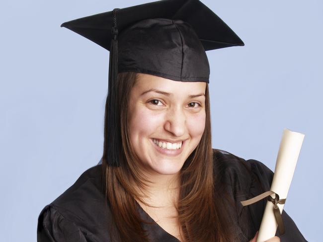 Thinkstock. Woman wearing graduation hat and gown. Graduate. Generic image.